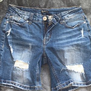 blue ripped jean shorts